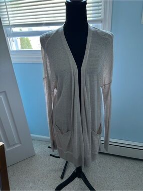 Women’s beige knit long sleeve sweater
